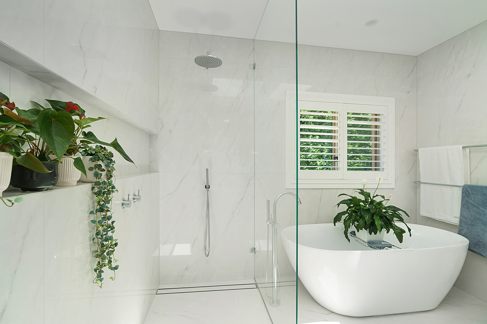 Bathroom renovation Bowral NSW — freestanding bath and marble tiles