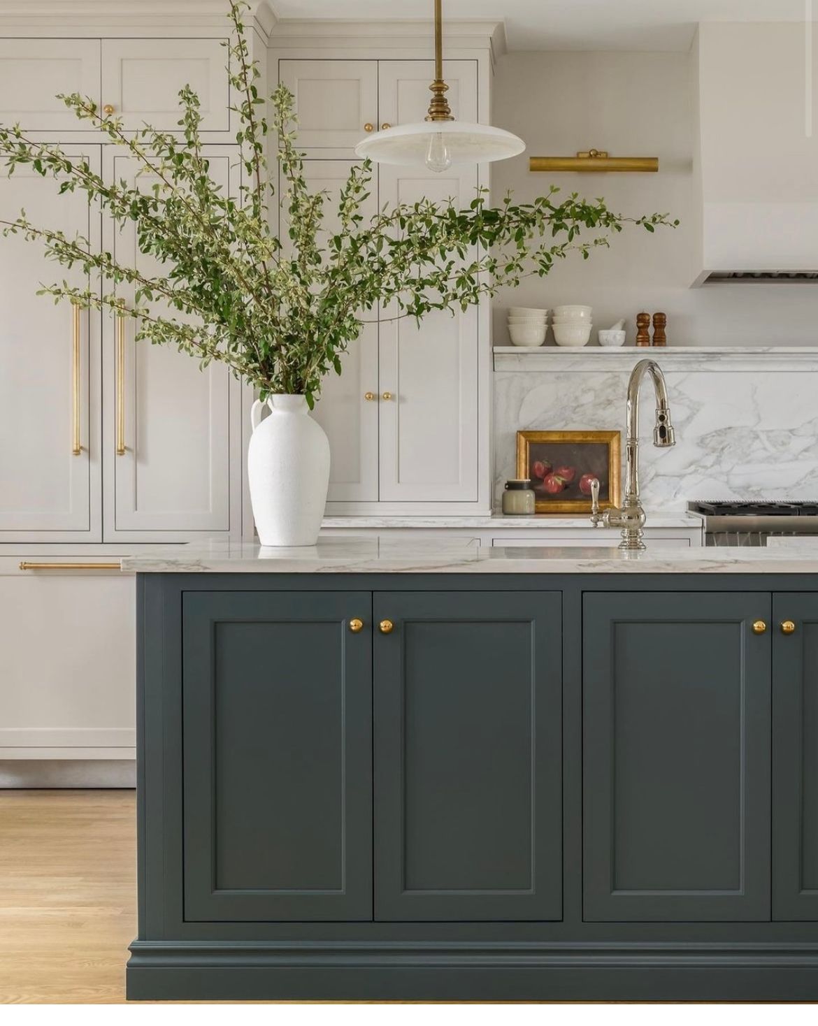 Green island kitchen renovation — marble benchtop, brass pendants, shaker cabinetry, Southern Highlands