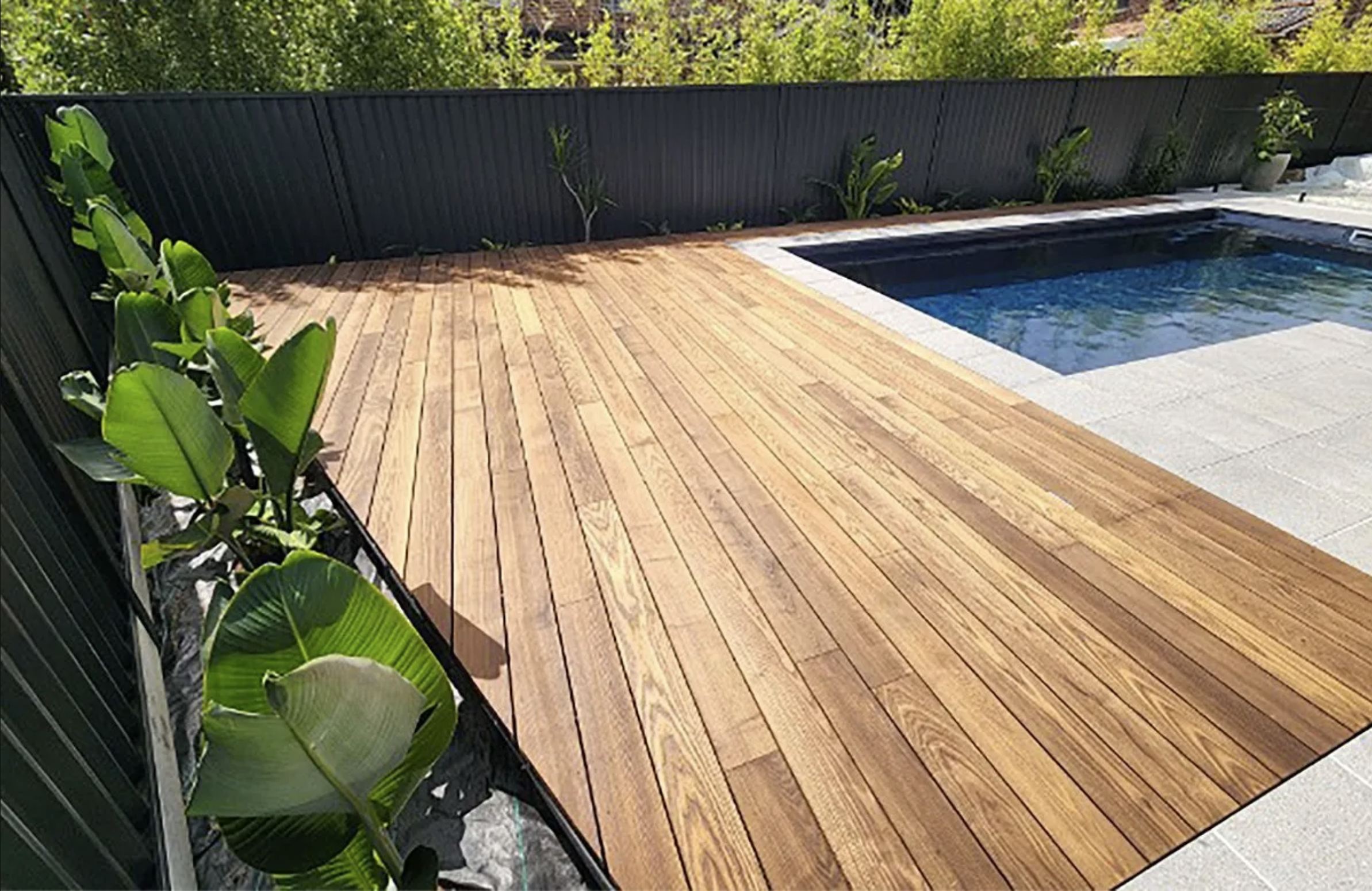 Custom pergola and deck entertaining area Southern Highlands NSW — string lights timber structure
